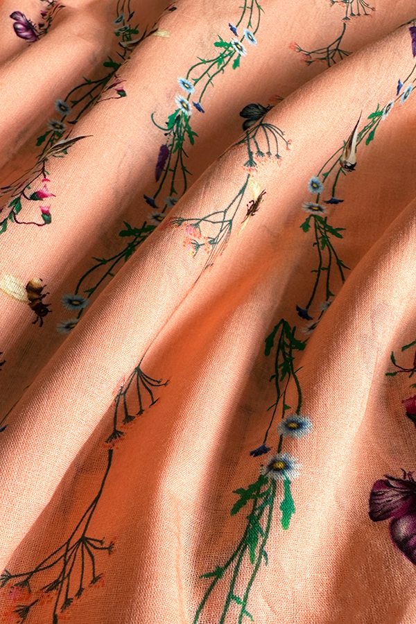 Butterfly Vines Peach in Cotton Mull (1.9 meters) - 1083 for the entire piece.